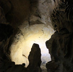 A Speleothem is Backlit Near the Marble Ceiling (Source: Heather Neis)